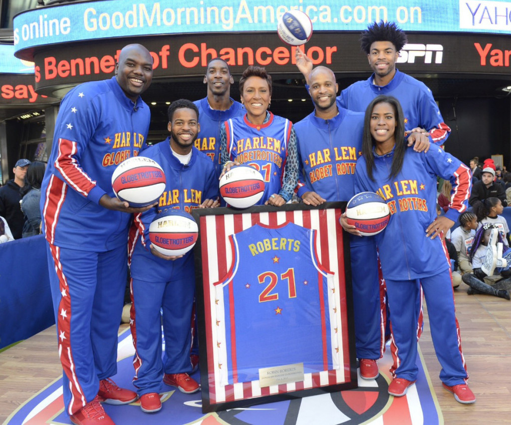 In celebration of 90 years of providing smiles, sportsmanship and service to millions of people worldwide, the world famous Harlem Globetrotters named TV personality Robin Roberts the 10th Honorary Harlem Globetrotter in team history, launched their new community outreach program, The Great Assist, and announced that tickets are on sale for their 90th year of touring the world. Photo courtesy of Ida Mae Astute/ABC. (PRNewsFoto/Harlem Globetrotters)