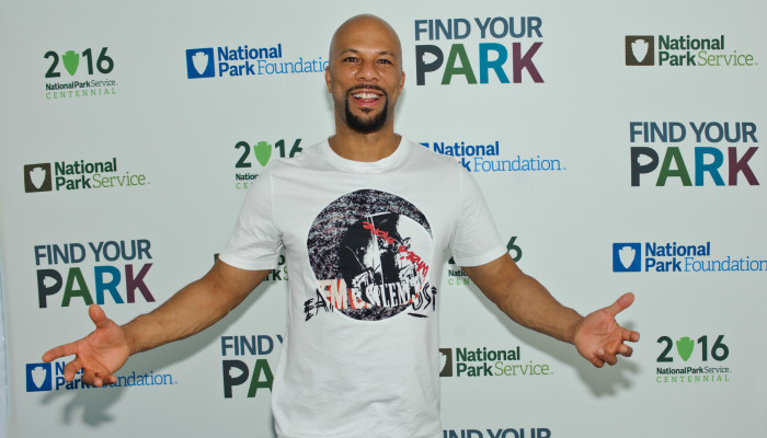 CHICAGO, IL - JUNE 11:  Common serves as Honorary Grand Marshal at the National Park Service Centennial Event at Washington Park on June 11, 2016 in Chicago, Illinois.  (Photo by Timothy Hiatt/Getty Images for the National Park Foundation)