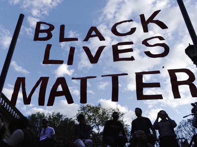 People take part in a rally on April 29, 2015 at Union Square in New York, held in solidarity with demonstrators in Baltimore, Maryland demanding justice for an African-American man who died of severe spinal injuries sustained in police custody. AFP PHOTO/Eduardo Munoz Alvarez (Photo credit should read EDUARDO MUNOZ ALVAREZ/AFP/Getty Images)