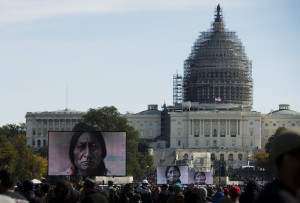 People listen to speeches during the Justice or Else! rally  on the National Mall in Washington, DC on October 10, 2015. The rally commemorates the 20th anniversary of the Million Man March which took place on October 16, 1995. (Andrew Caballero-Reynolds/AFP-Getty Images)Justice or Else! 20th Anniversary Million Man March